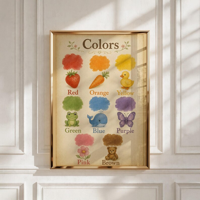 May include: A framed educational wall art print titled Colors, featuring illustrations of a red strawberry, orange carrot, yellow duck, green frog, blue whale, purple butterfly, pink flower, and brown teddy bear, each with its color name below.