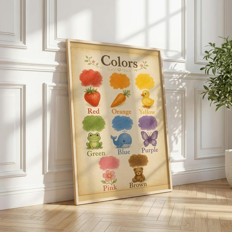 May include: A framed educational wall art print titled Colors, featuring watercolour-style illustrations of a red strawberry, orange carrot, yellow duck, green frog, blue whale, purple butterfly, pink flower, and brown teddy bear on a beige background.