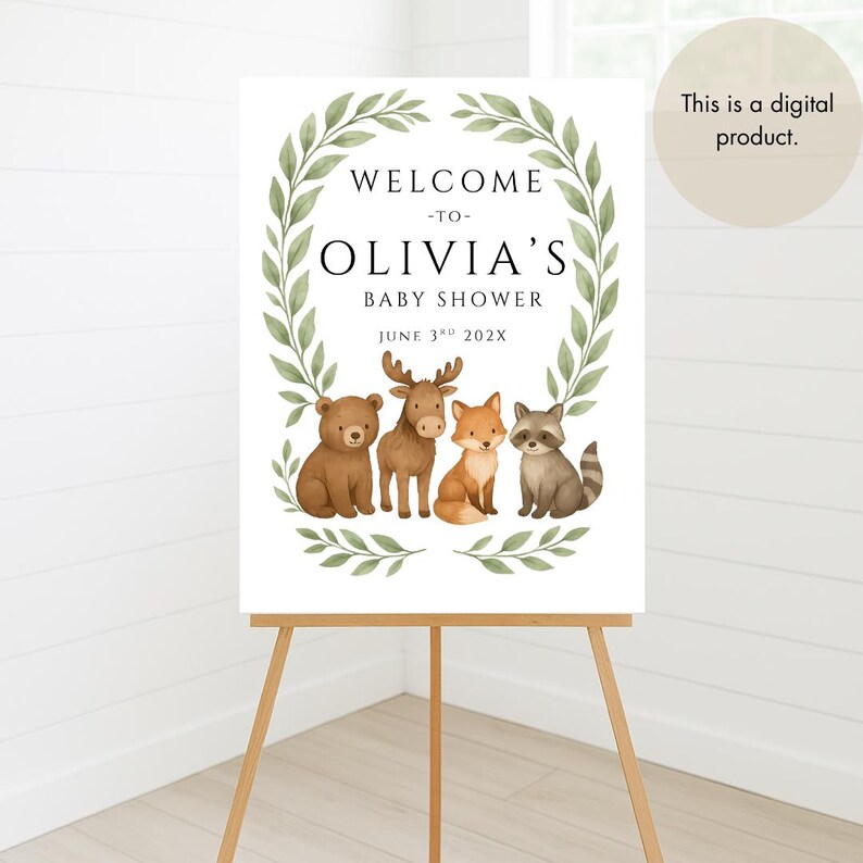 May include: Welcome to Olivia's Baby Shower sign with a green leafy wreath and four woodland animals: a bear, moose, fox, and raccoon. The sign says "Welcome to Olivia's Baby Shower" and "June 3rd 202X".