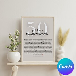 May include: A framed print with the words "50 Reasons We Love You" in a stylish font. The print is light gray with black text and a list of reasons. The print is displayed on a wooden shelf with a white vase and flowers.