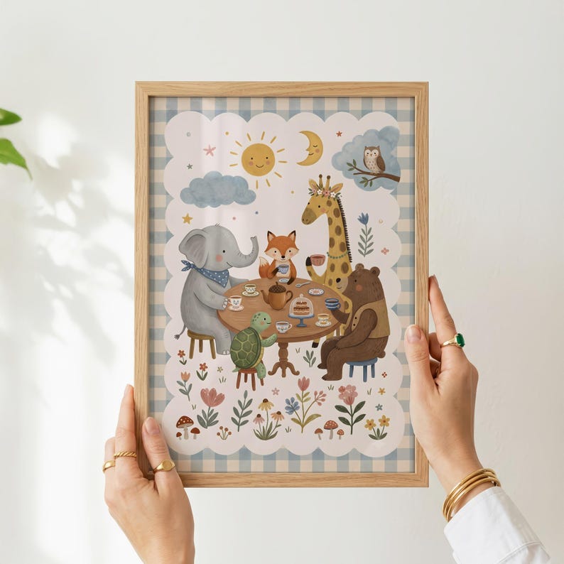 May include: A framed wall art print featuring a light blue and white gingham border. The illustration depicts an elephant, fox, giraffe, turtle, and bear sitting around a round table for tea, surrounded by flowers, mushrooms, a sun, and moon.
