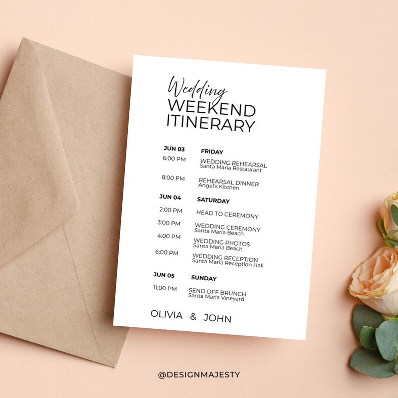 May include: A white wedding weekend itinerary card with black text. The card lists the schedule for the wedding, including the rehearsal, ceremony, photos, and reception. The card is next to a beige envelope and flowers.