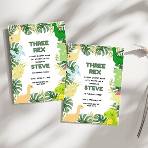 May include: Two green and white dinosaur birthday party invitations with a jungle theme. The invitations feature a green, yellow, and blue dinosaur with the text "Three Rex" and "Stomp, Chomp, Roar Let's Party Like a Dinosaur Steve is Turning Three!"