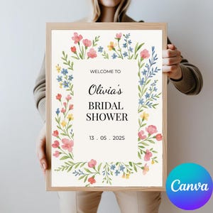 May include: A printable bridal shower sign with a floral border. The sign says "Welcome to Olivia's Bridal Shower 13.05.2025".