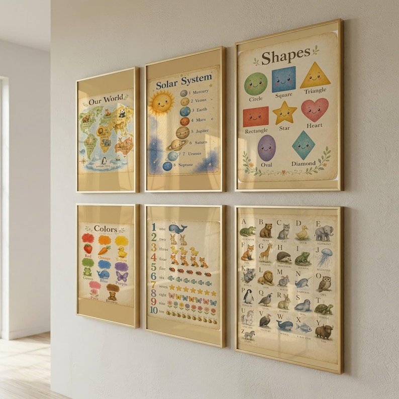 May include: A set of six educational wall posters in gold frames featuring illustrations of the world map, solar system, shapes, colors, numbers, and an animal alphabet. Each poster displays text labels for the depicted items in a clear font.