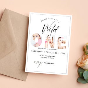 May include: A white invitation card with the text "Olivia Stone is a Wild One" and three baby photos. The invitation includes the date, time, and RSVP information. A brown envelope is visible in the background.