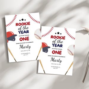 May include: Two baseball-themed birthday party invitations with red, white, and blue accents. The invitations feature the text "Rookie of the Year is hitting the big one" and a baseball, bat, and baseball cap. The invitations are for a party for Marty.