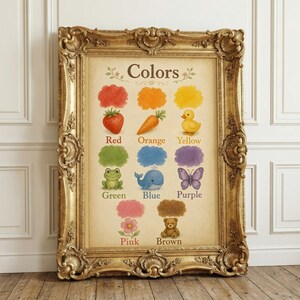 May include: A framed educational poster titled Colors featuring illustrations of a red strawberry, orange carrot, yellow duck, green frog, blue whale, purple butterfly, pink flower, and brown teddy bear, each paired with its corresponding colour name.