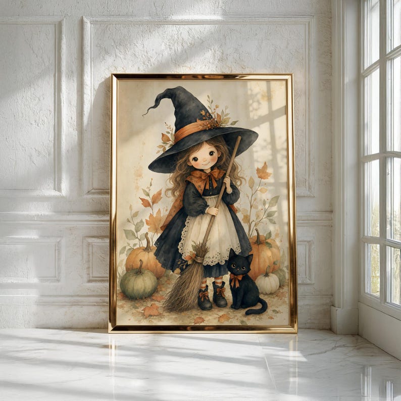 Puede incluir: Una l&aacute;mina de arte enmarcada con una ilustraci&oacute;n de dibujos animados de un ni&ntilde;o disfrazado de bruja con sombrero y vestido negros, delantal blanco y una escoba. Un gato negro est&aacute; sentado cerca, rodeado de calabazas naranjas y verdes y hojas.