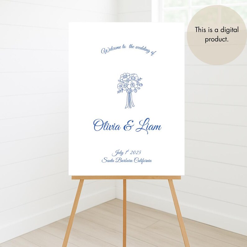 May include: A white wedding welcome sign on a wooden easel. The sign features blue script that reads "Welcome to the wedding of Olivia & Liam" with the date July 1st, 2025, and Santa Barbara, California. A digital product.