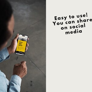 May include: A person is looking at a smartphone screen displaying a website with the text "Stay in touch with us".