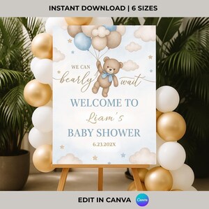 Editable blue teddy bear baby shower welcome sign with balloons, clouds, and gold stars. Perfect for boy baby showers, printable in Canva with custom name and date.
