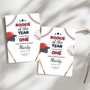 May include: Two baseball-themed birthday party invitations with red, white, and blue accents. The invitations feature a baseball bat, baseball, and a baseball cap. The text on the invitations reads "Rookie of the Year is hitting the big one" and includes the name "Marty" and party details.