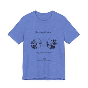 May include: A blue t-shirt with the text "The String & Notch" above two archers aiming bows and arrows. The text "Solving problems from a distance" is below the archers. The shirt also has the text "MIST REALM".