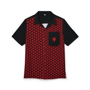 May include: A black and red short-sleeved button-up shirt with a red geometric pattern. The shirt has a black pocket on the left side with a red geometric design.