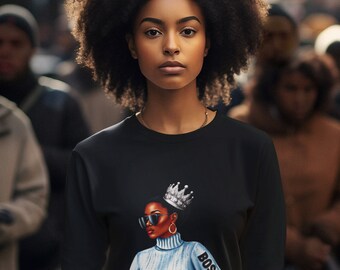 May include: A black sweatshirt with a graphic print of a woman wearing a crown and sunglasses. The graphic also includes the word "BOSS".