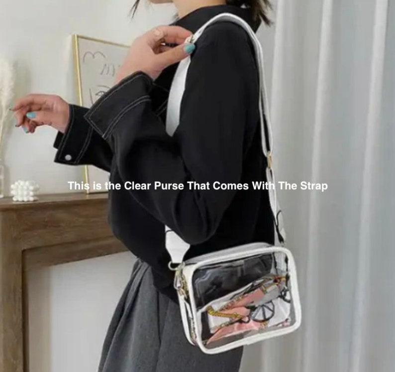 May include: A clear plastic purse with a white frame and a white adjustable strap. The purse has a clear view of the inside, which is filled with a patterned fabric.