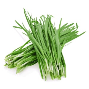 May include: Fresh green chives, a popular herb, are displayed against a white background. The chives have long, slender, vibrant green leaves and white stems. This image showcases the natural color and texture of the fresh herb.