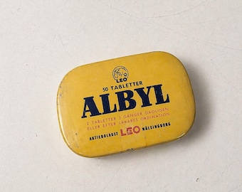 Caja de hojalata vintage ALBYL Suecia Leo Helsingborg Caja metálica para pastillas amarilla de farmacia