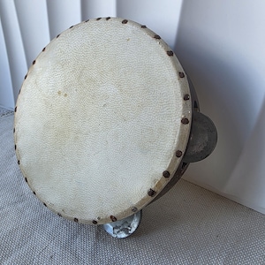 Rare vintage wooden tambourine with natural skin top and metal jingles – 14.5 cm diameter