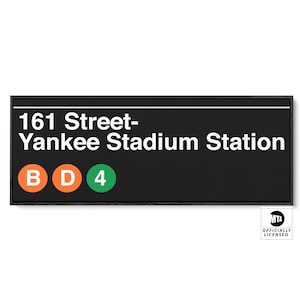 May include: Black and white subway sign with the text "161 Street-Yankee Stadium Station" and the letters "B", "D", and "4" in colored circles.