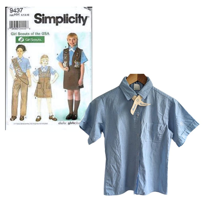 May include: A pale blue short-sleeved shirt with a pocket and a tag, displayed on a wooden hanger. Beside it is a Simplicity sewing pattern for Girl Scout uniforms, with uniform illustrations.