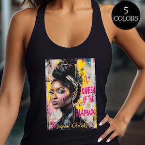 May include: Black tank top featuring a colorful portrait of a woman with the text "QUEEN OF THE CLAPBACK" and the name "Jasmine Crockett." A circular graphic indicates the availability of five colors.