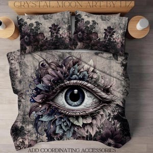 May include: A duvet cover with a large eye surrounded by flowers and leaves. The eye is blue with a black pupil. The background is a distressed gray and white pattern. The text "ADD COORDINATING ACCESSORIES" is at the bottom of the image.