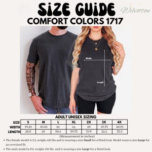 May include: A size guide for Comfort Colors 1717 adult unisex t-shirts. The image shows a man and a woman wearing the shirts. The size chart includes measurements in inches (converted to cm) for width and length, ranging from size small to 4X.
