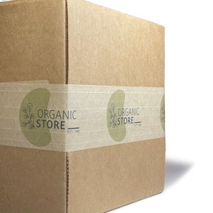 May include: A brown cardboard box with a white tape label that says "ORGANIC STORE EST. 1980" in a green circle with a leaf design.