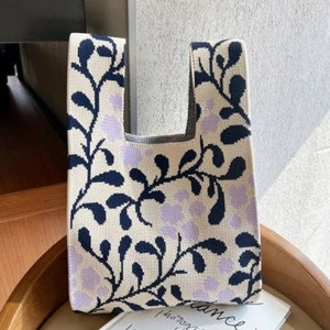 Rosa Blumenentwurf handgemachte Strickhandtaschen-Frauen-Knoten-Handgelenk-Taschen-lässige Taschen-wiederverwendbare Taschen