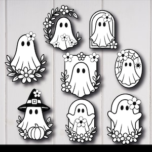 Peut inclure: Plusieurs illustrations de fantômes en noir et blanc avec des accents floraux et sur le thème d'Halloween. Les fantômes sont représentés sous diverses formes, certains avec des chapeaux de sorcière, des citrouilles et des toiles d'araignées. Parfait pour les décorations d'Halloween ou les projets d'artisanat.