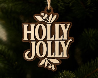 May include: Wooden Christmas ornament with the words "HOLLY JOLLY" in a layered design. The ornament is brown with light beige lettering and decorative leaf accents. A twine loop is attached for hanging on a Christmas tree.