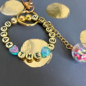 Kylie Break the Tension Gold Keyring Keychain with charm