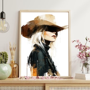 Art mural abstrait cow-girl - toile western moderne avec femme blonde en chapeau de cow-boy, style ferme rustique pour une décoration unique.