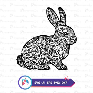 May include: A black and white line art illustration of a rabbit with intricate Celtic knotwork patterns. The rabbit is sitting on its haunches with its ears perked up.
