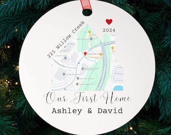 May include: White round ornament with a map of Willow Creek, a red heart, and the text "221 Willow Creek 2024 Our First Home Ashley & David".