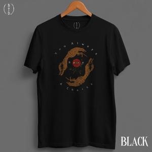 May include: Black t-shirt with a circular design featuring two hands, a red rose, and the text "You Always Have A Choice." The hands are brown, and the text is white. The word "BLACK" is printed in white at the bottom right.