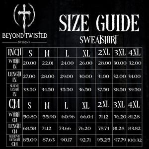 May include: A black size guide chart for a sweatshirt by Beyond Twisted Designs. The table displays width, length, and sleeve length measurements in inches and centimeters for sizes S through 4XL, set against a dark forest background.