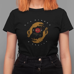 May include: Black t-shirt featuring a graphic design with the text "You Always Have A Choice." The design includes two hands in a circle around a red rose. The text and hands are in a distressed, vintage style.