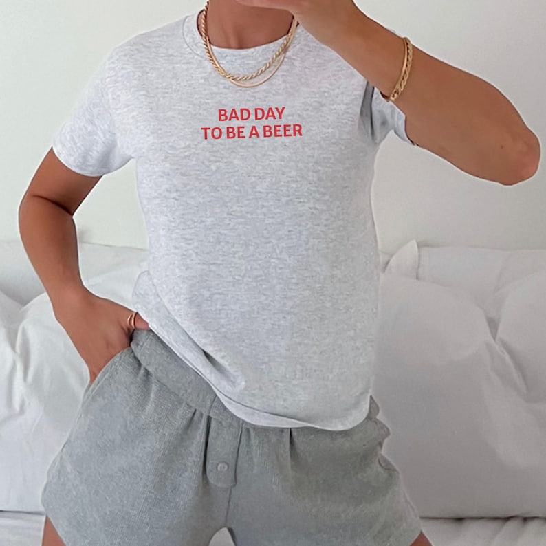 Bad Day to Be a Beer Baby Tee, Funny Drinking Shirt, 4th of July Outfit, USA Party Tee, Lake Day Shirt, Trendy Summer Graphic Tee, Baby Tee