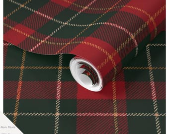 May include: A roll of wallpaper featuring a dark green and red plaid pattern with thin gold intersecting lines. The surface has a textured finish. Text on the image includes Non Toxic, USA Sourced & Printed, Hand Designed, and Driftwood & Co.