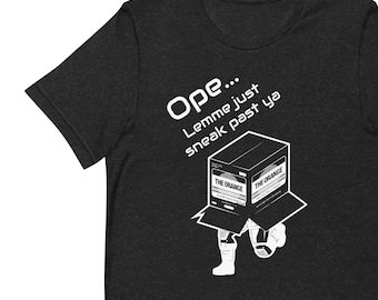 Solid Sneak: Metal Gear Solid T-Shirt with 'Ope, Lemme Sneak Right Past Ya' Featuring Solid Snake in a Cardboard Box