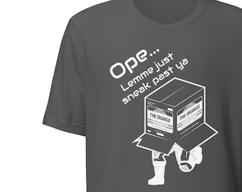 Solid Sneak: Metal Gear Solid T-Shirt with 'Ope, Lemme Sneak Right Past Ya' Featuring Solid Snake in a Cardboard Box