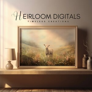 May include: A framed print featuring a lamb standing in a field of wildflowers under a soft, pastel sky. The artwork is displayed on a wooden table with a lamp and decorative vases. The text "Heirloom Digitals - Timeless Creations" is at the top.