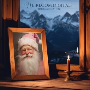 May include: A framed portrait of Santa Claus with a pink hat and white beard, sitting on a wooden windowsill with a lit candle in front of it. The window is open and shows a snowy mountain range in the distance.