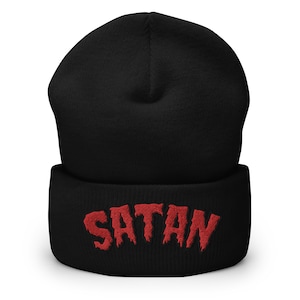 May include: Black beanie with a red embroidered "SATAN" on the cuff.