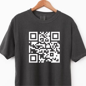 May include: A dark gray t-shirt with a white QR code printed on the front.