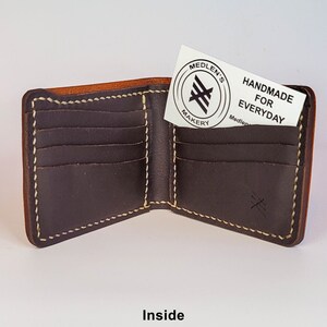 Cartera plegable de cuero