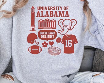 May include: A heather gray sweatshirt with a red graphic design featuring the text "UNIVERSITY OF ALABAMA" and various icons, including a lighthouse, a building, an elephant, a football helmet, a football, and a jersey with the number 16.
